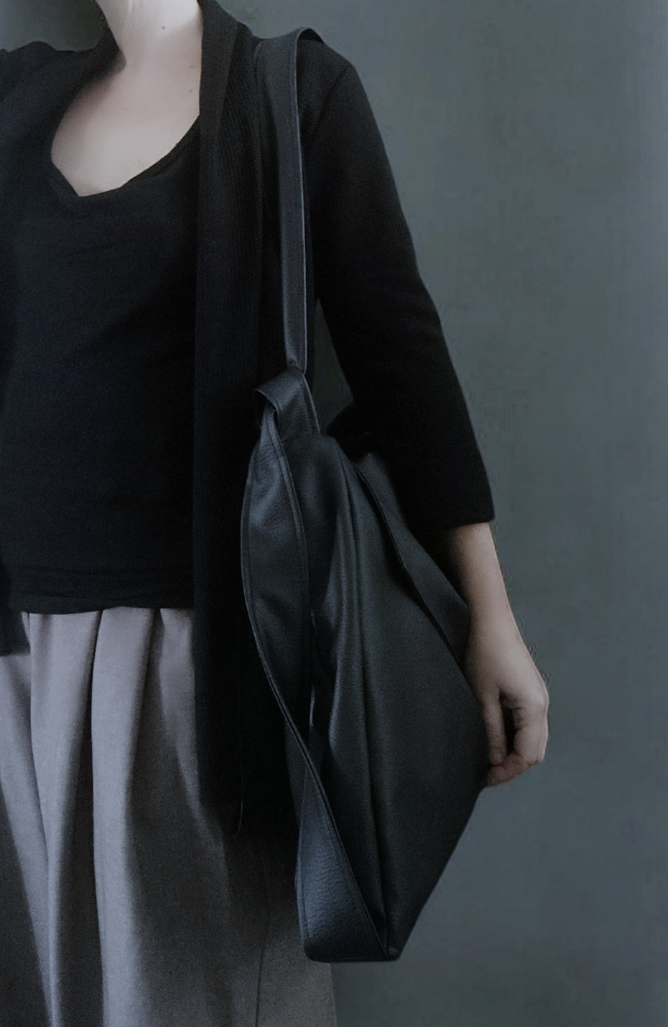 Borsa in pelle sintetica convertibile in zainetto