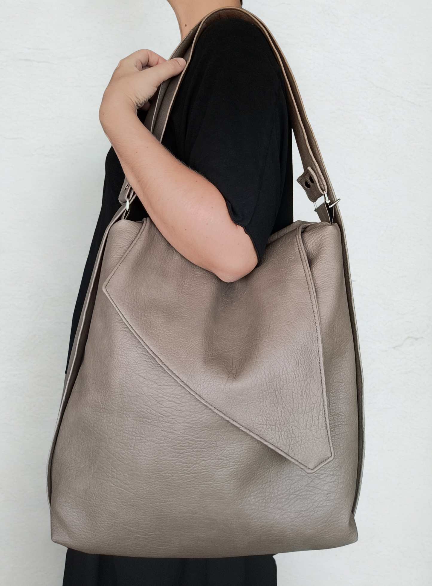 Borsa zaino in pelle sintetica
