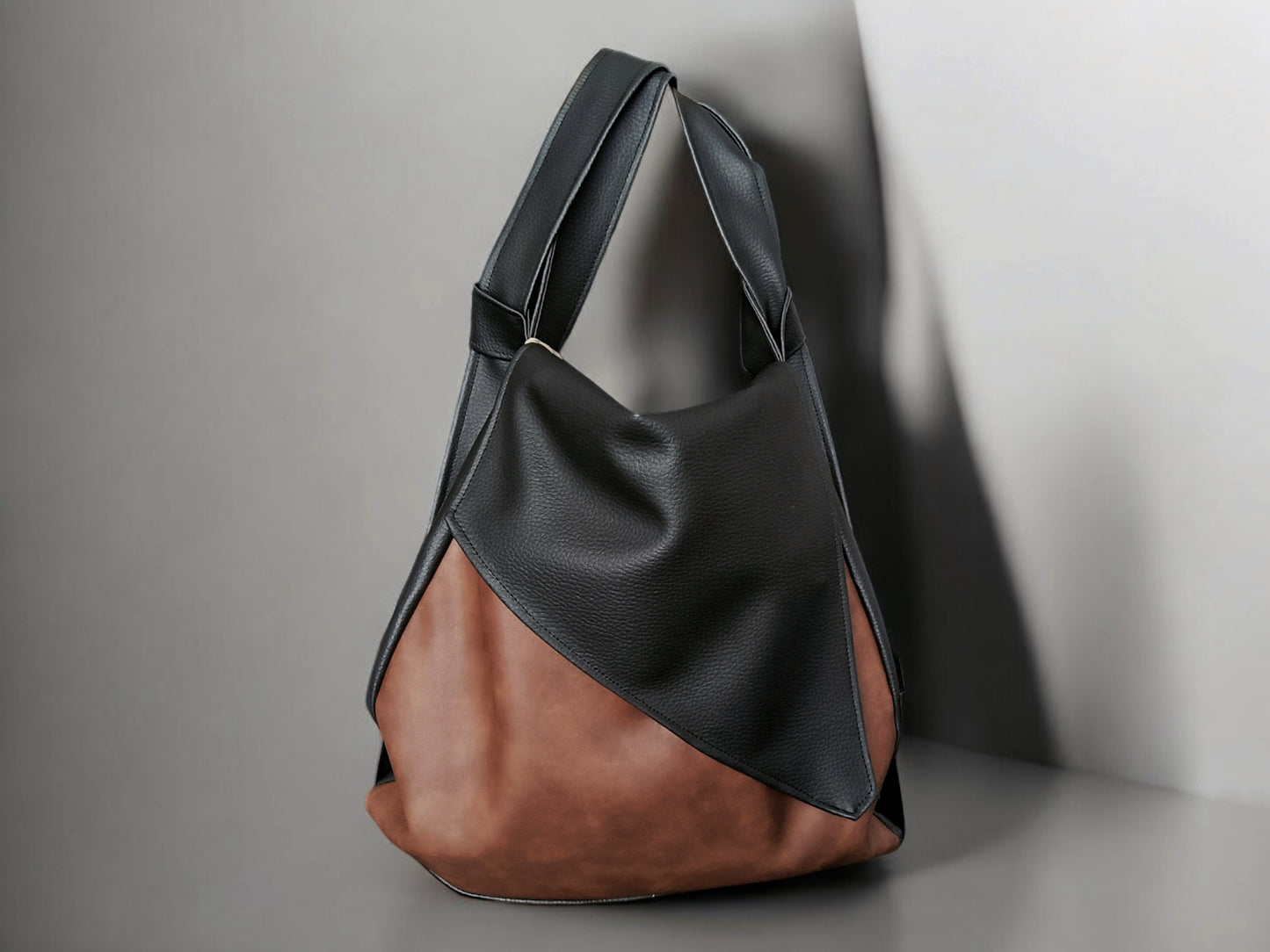 Borsa convertibile in zainetto in pelle sintetica