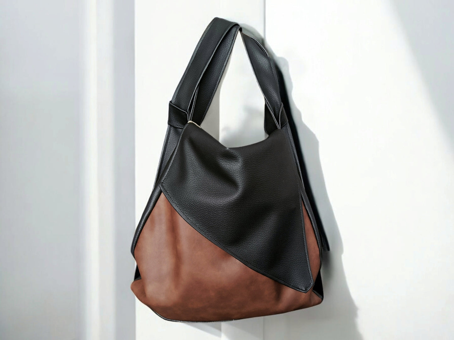 Borsa convertibile in zainetto in pelle sintetica