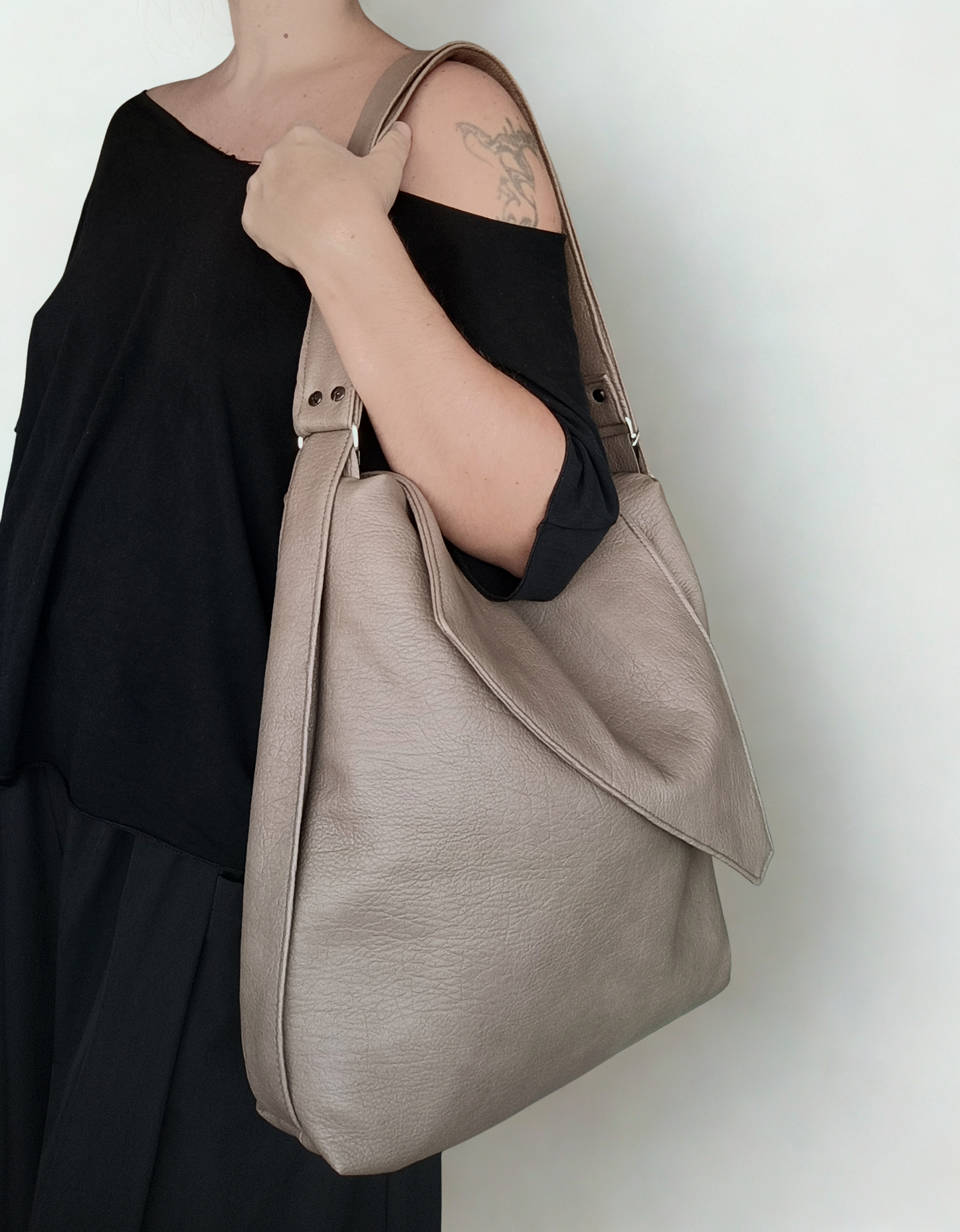 Borsa zaino in pelle sintetica