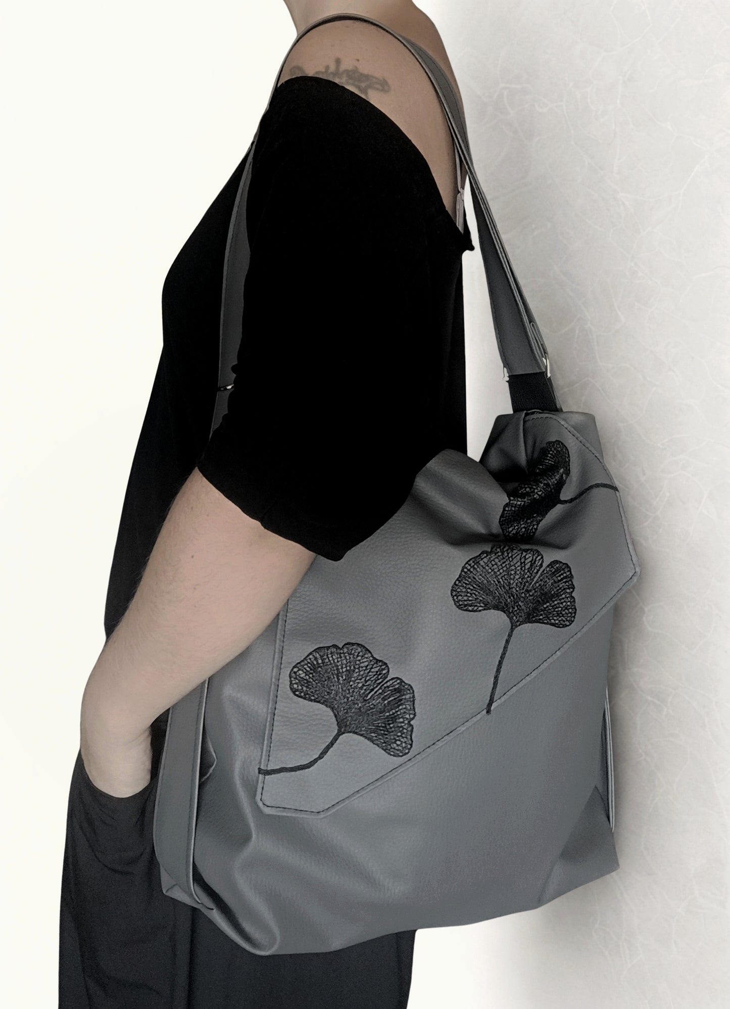 Borsa zaino in pelle sintetica