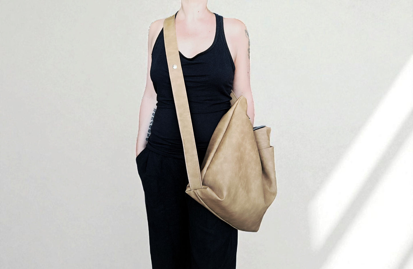 Crossbody bag in pelle sintetica