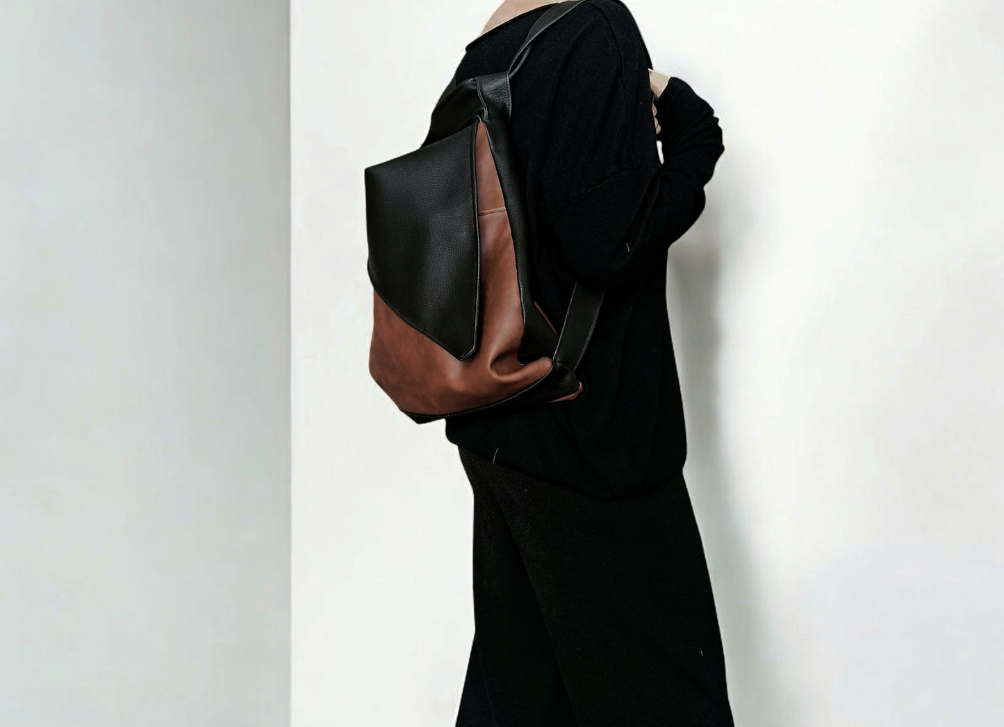 Borsa convertibile in zainetto in pelle sintetica