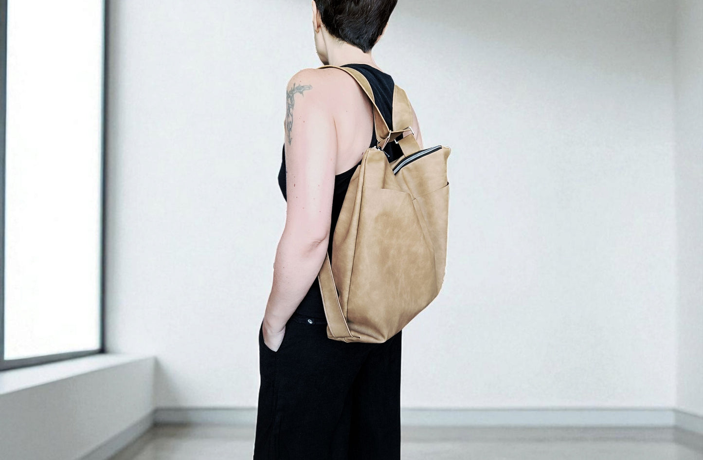 Crossbody bag in pelle sintetica