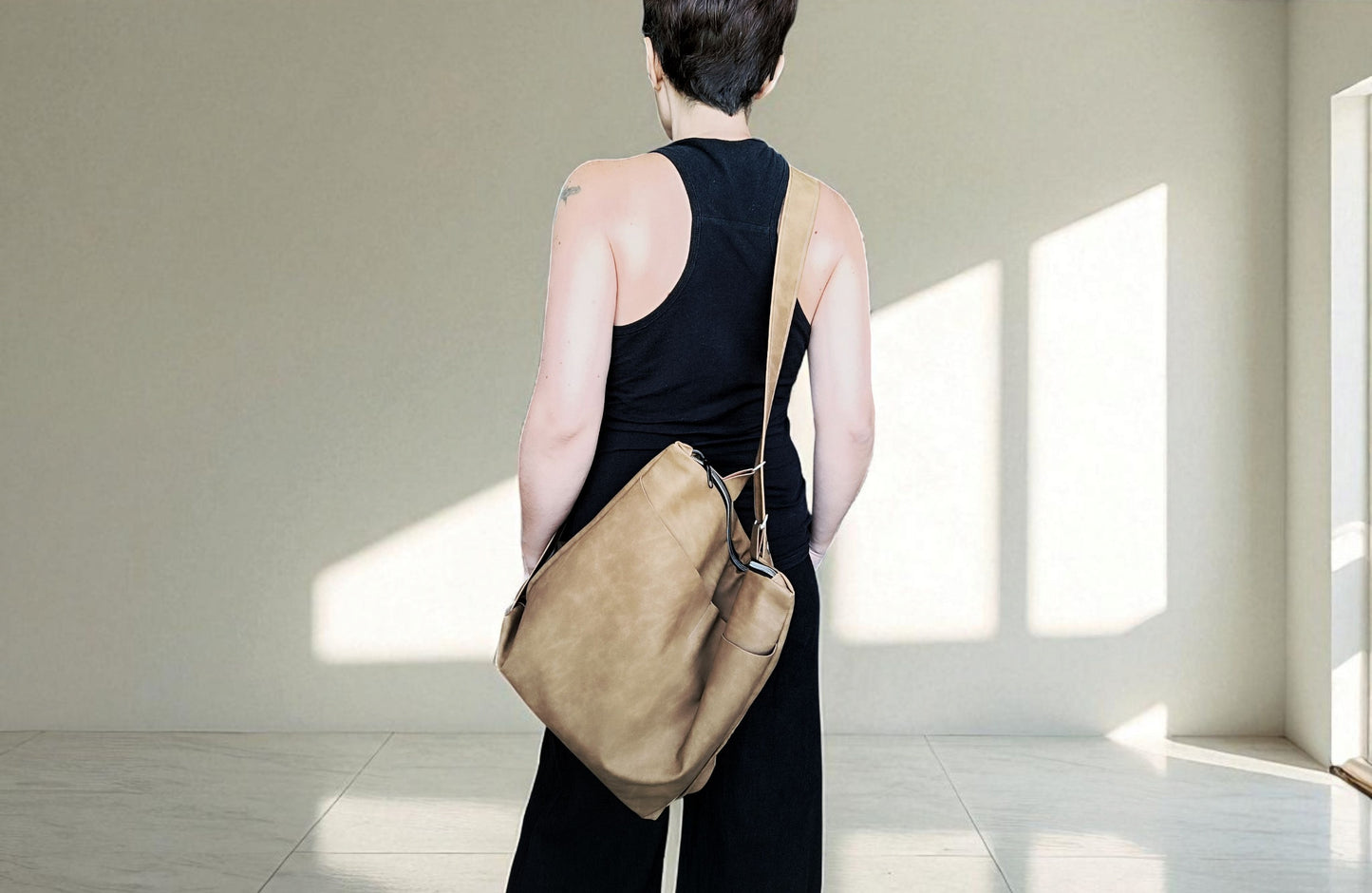 Crossbody bag in pelle sintetica