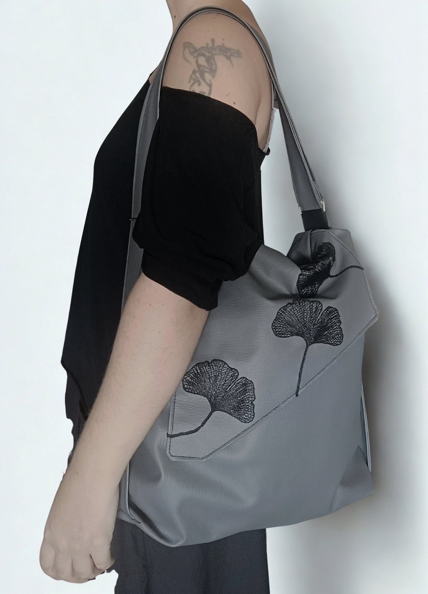 Borsa zaino in pelle sintetica