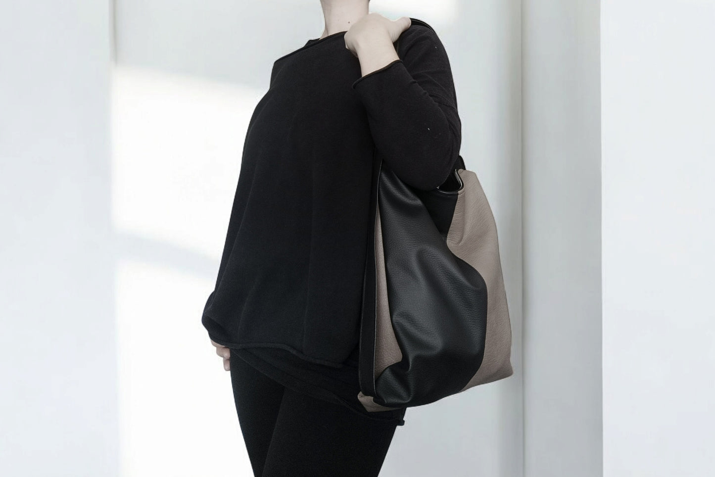 Borsa zaino in pelle sintetica