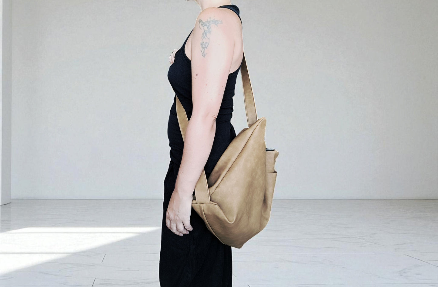 Crossbody bag in pelle sintetica